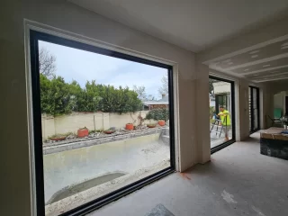 Bold frames for a bold home! Our MAGNUM Designer Series framing stands out with its impressive strength and size. We manufactured and installed these frames at a stunning Brighton property. Paired with @austview Sashless Windows, it creates the perfect sleek and modern aesthetic. #designerseries #magnum #windowinstallation